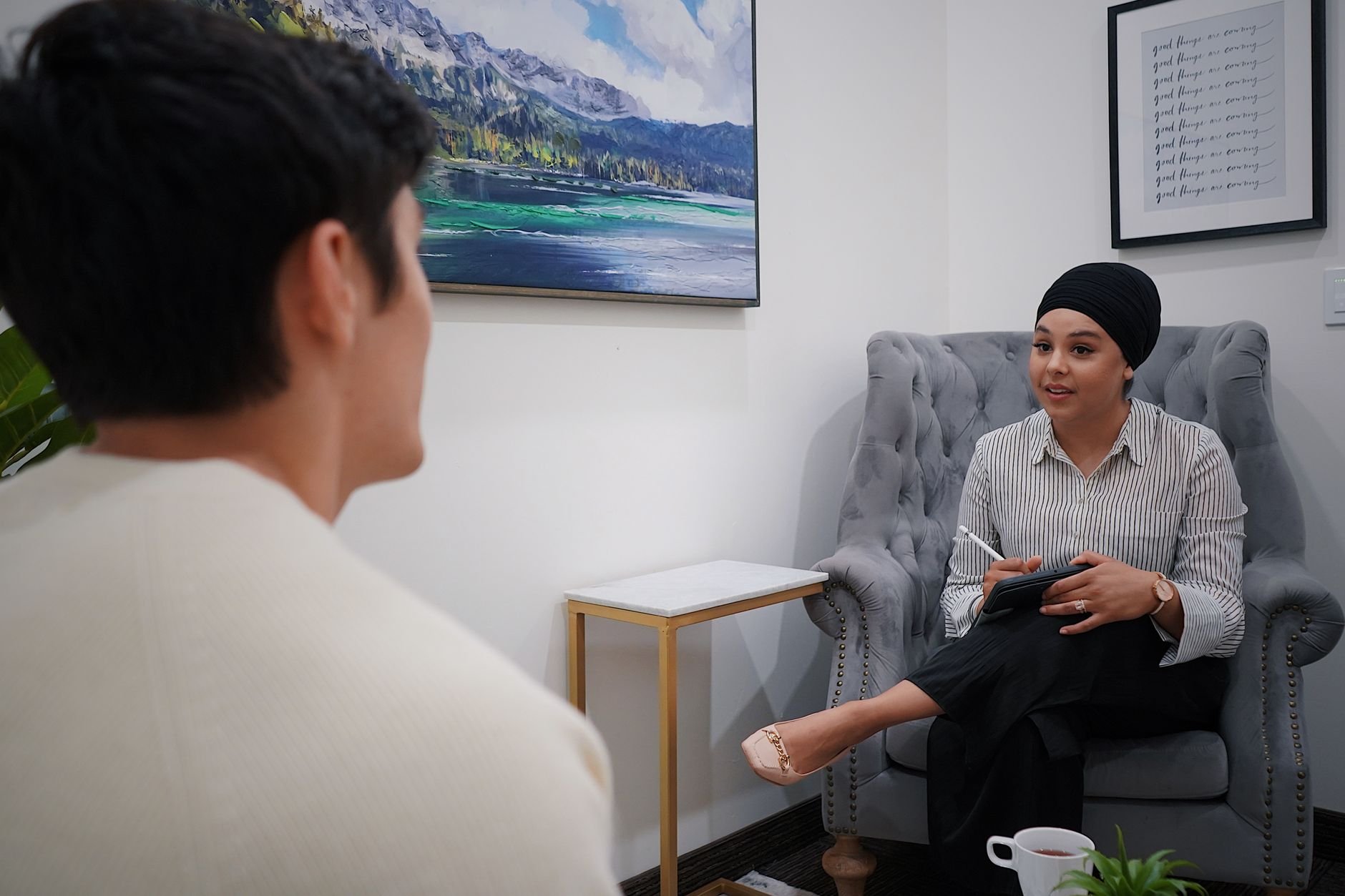 One-on-one professional coaching session in a modern office